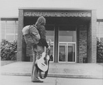 Jacque Evans at Kemp Hall Entrance