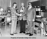 Bob O'Neill Presenting a Check to College President Jerry Young