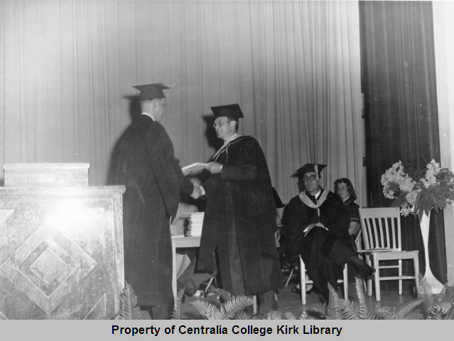 Receiving the Diploma