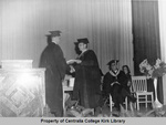 Receiving the Diploma