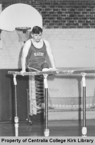 Mike Mullins on parallel bars - Men's Gymnastics